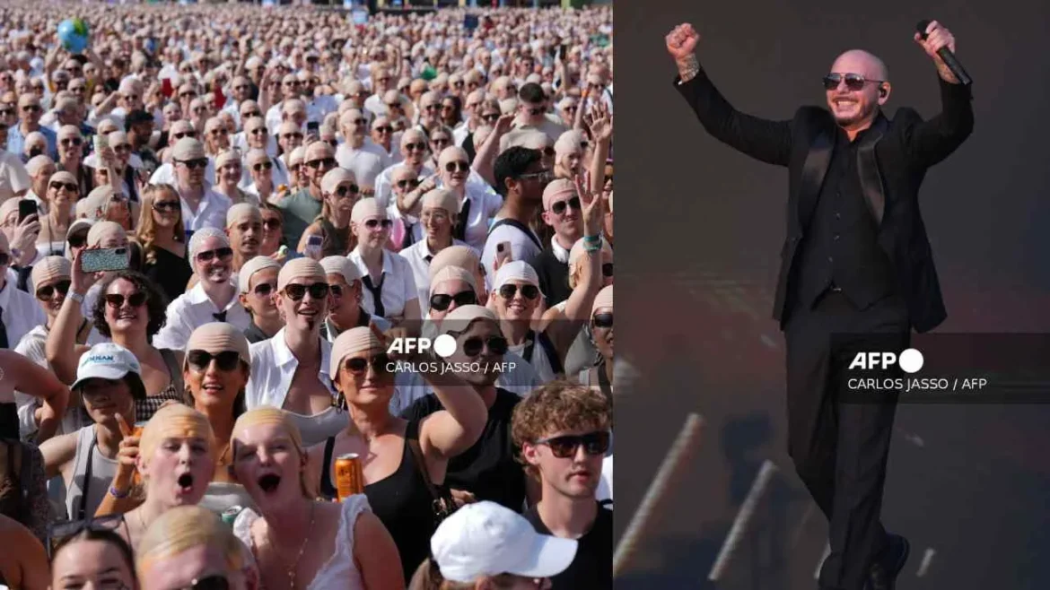 Pitbull establece Récord Guinness por mayor concentración de personas con calvas postizas en concierto